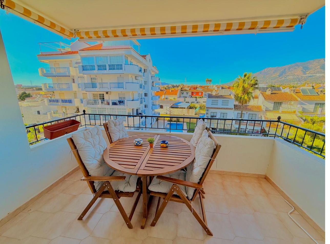 Balcony with dining table